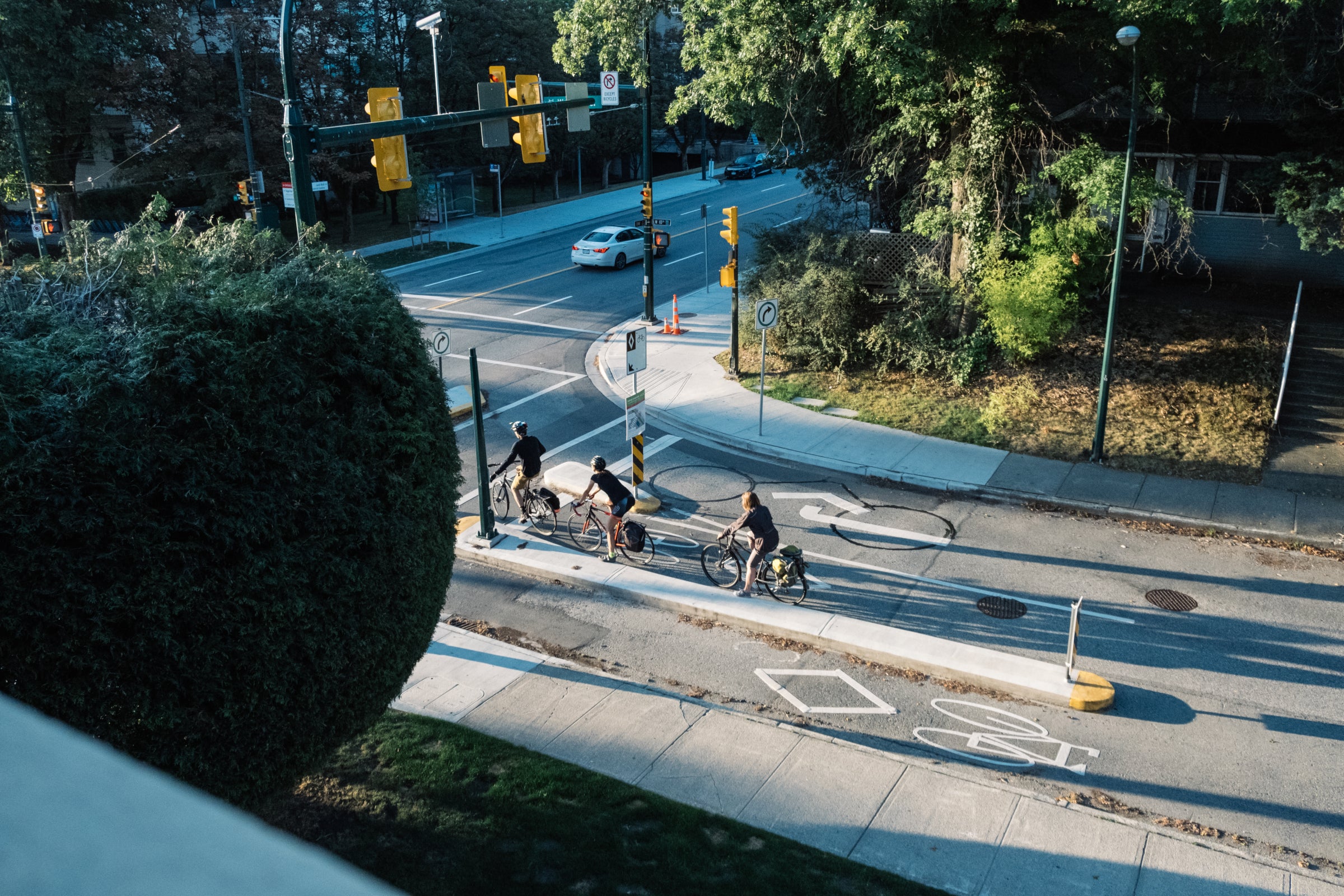 Aerial view of cyclists commuting in a city street